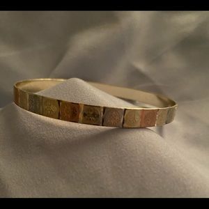 Tri colored bangle bracelet.
